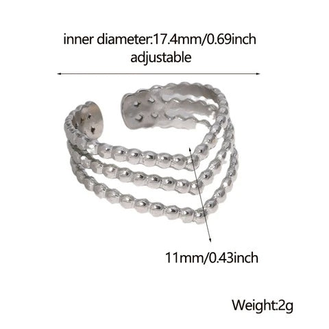 Silver ring with measurements on a white background