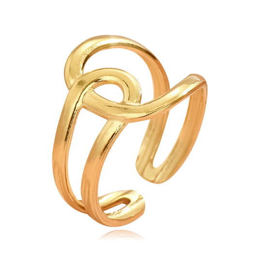 gold geometric ring on white background