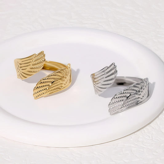 gold and silver waterproof rings on white dish