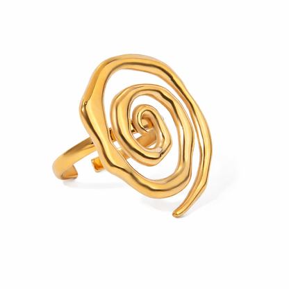 Gold spiral ring on a white background