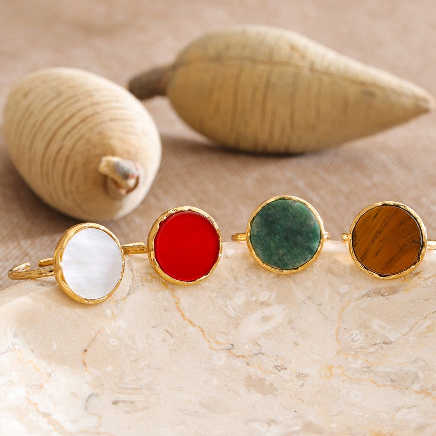 4 gold rings with natural stone in various colors