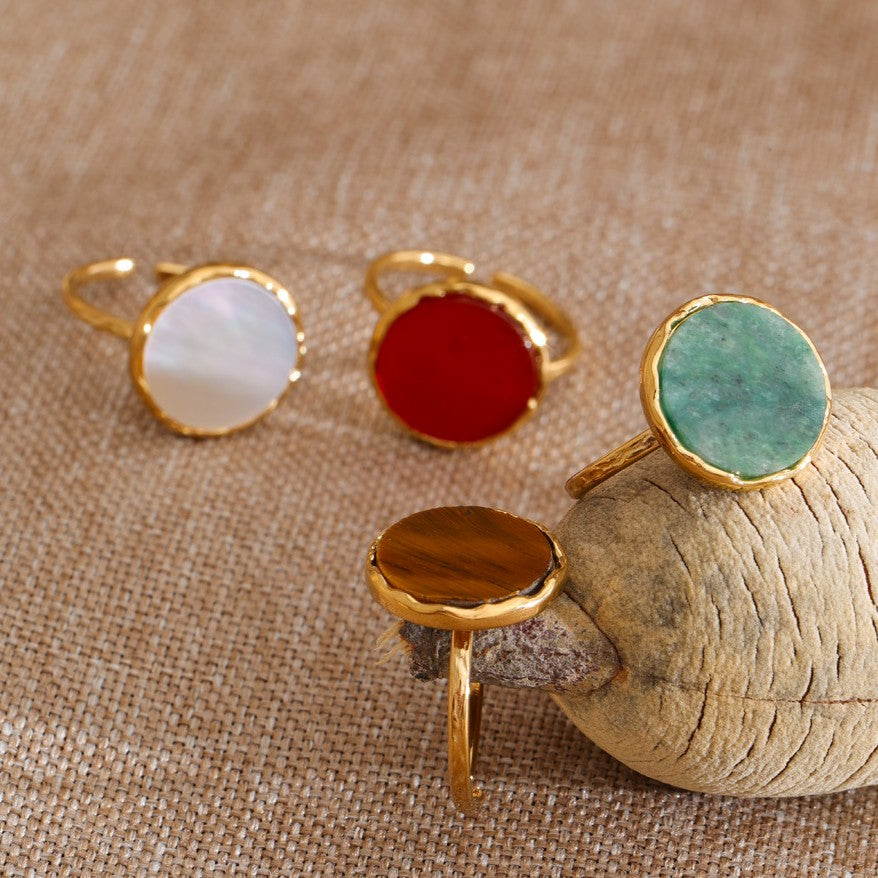 4 gold rings with natural stone in various colors