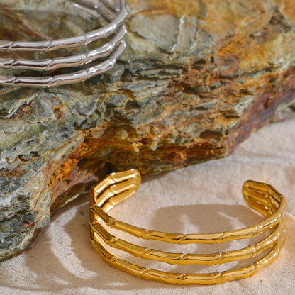 two stainless steel bangles
