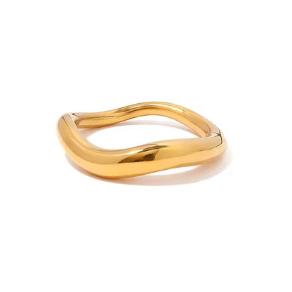 Gold ring on a white background