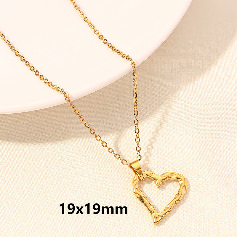 Gold heart-shaped necklace on a beige background with '19x19mm' text.