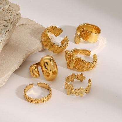 Set of gold rings on a light background