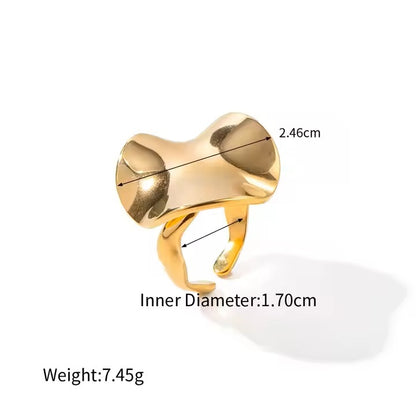 Gold ring with measurements on a white background