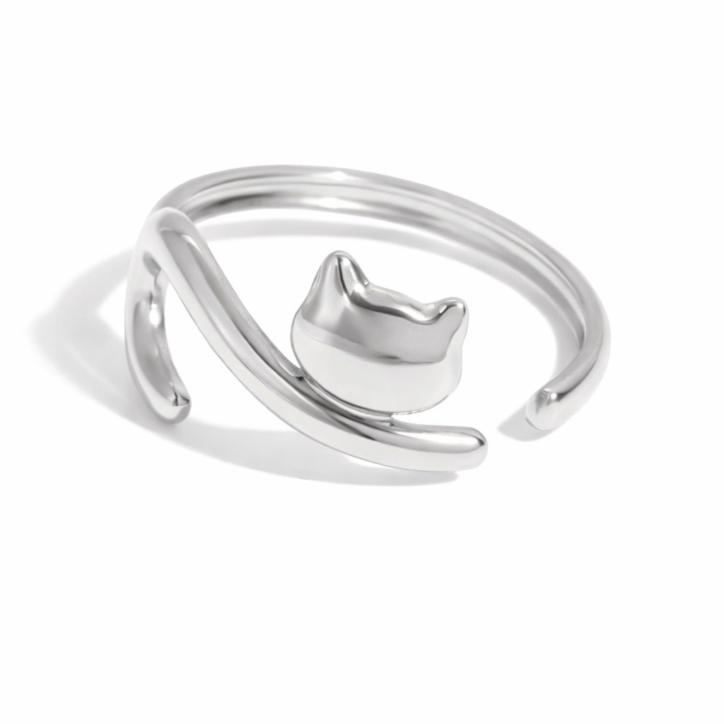 Silver cat-shaped ring on a white background