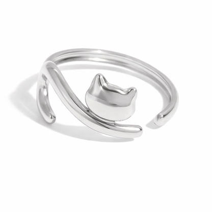 Silver cat-shaped ring on a white background