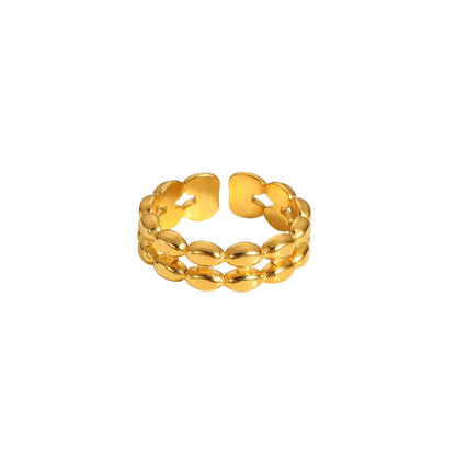 Gold ring with a chain-like design on a white background