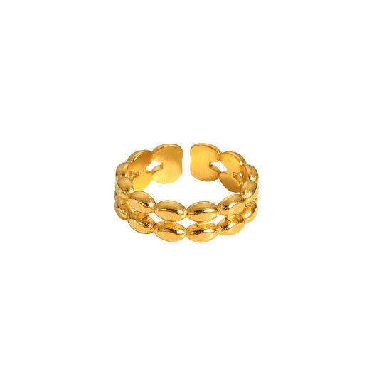 Gold ring with a chain-like design on a white background