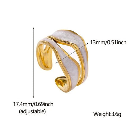 Gold and white adjustable ring with measurements on a white background