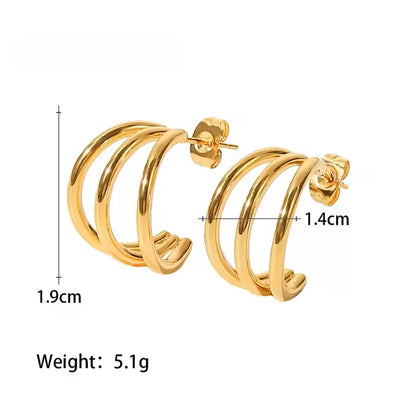 Gold hoop stainless steel earrings with measurements on a white background
