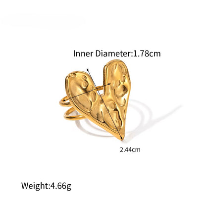 Gold ring with measurements on a white background