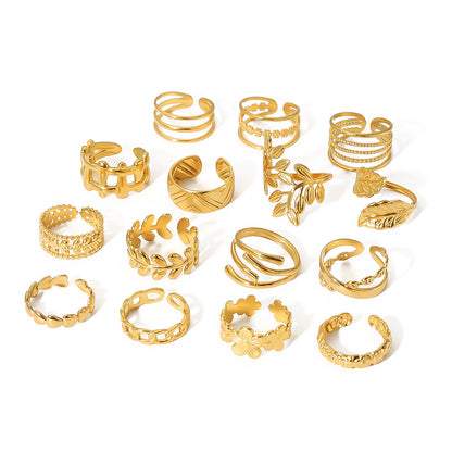 multiple gold rings on white background