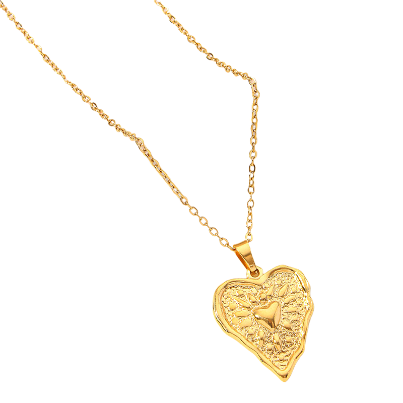 Gold stainless steel heart-shaped pendant necklace on a white background
