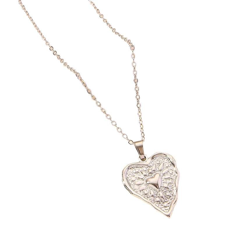 Silver stainless steel Heart-shaped diamond pendant on a gold chain against a white background
