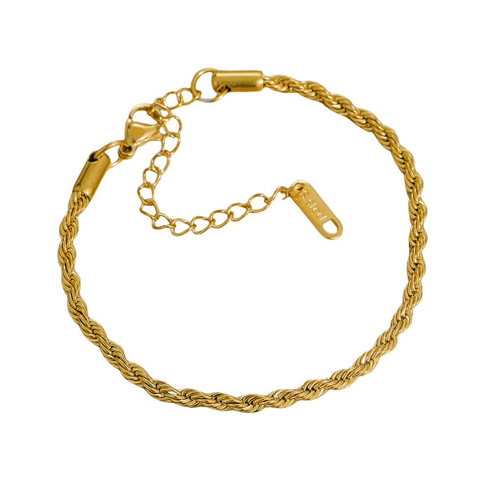 Gold stainless steel bracelet on a white background