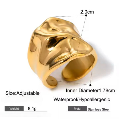 Gold ring with measurements and features on a white background