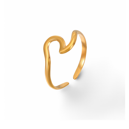 minimalist gold ring on white background