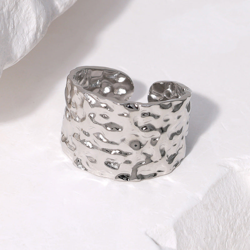 silver chunky ring on white background