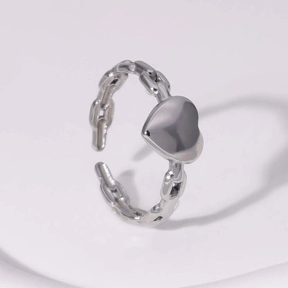 silver tarnish-free heartshaped ring on white background
