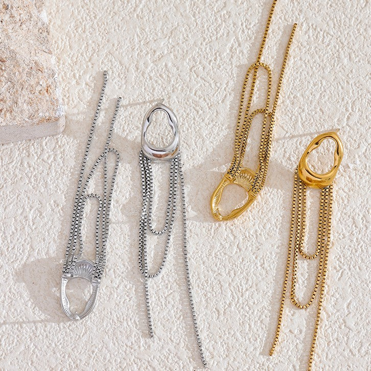 two pairs of long statement earrings made of stainless steel