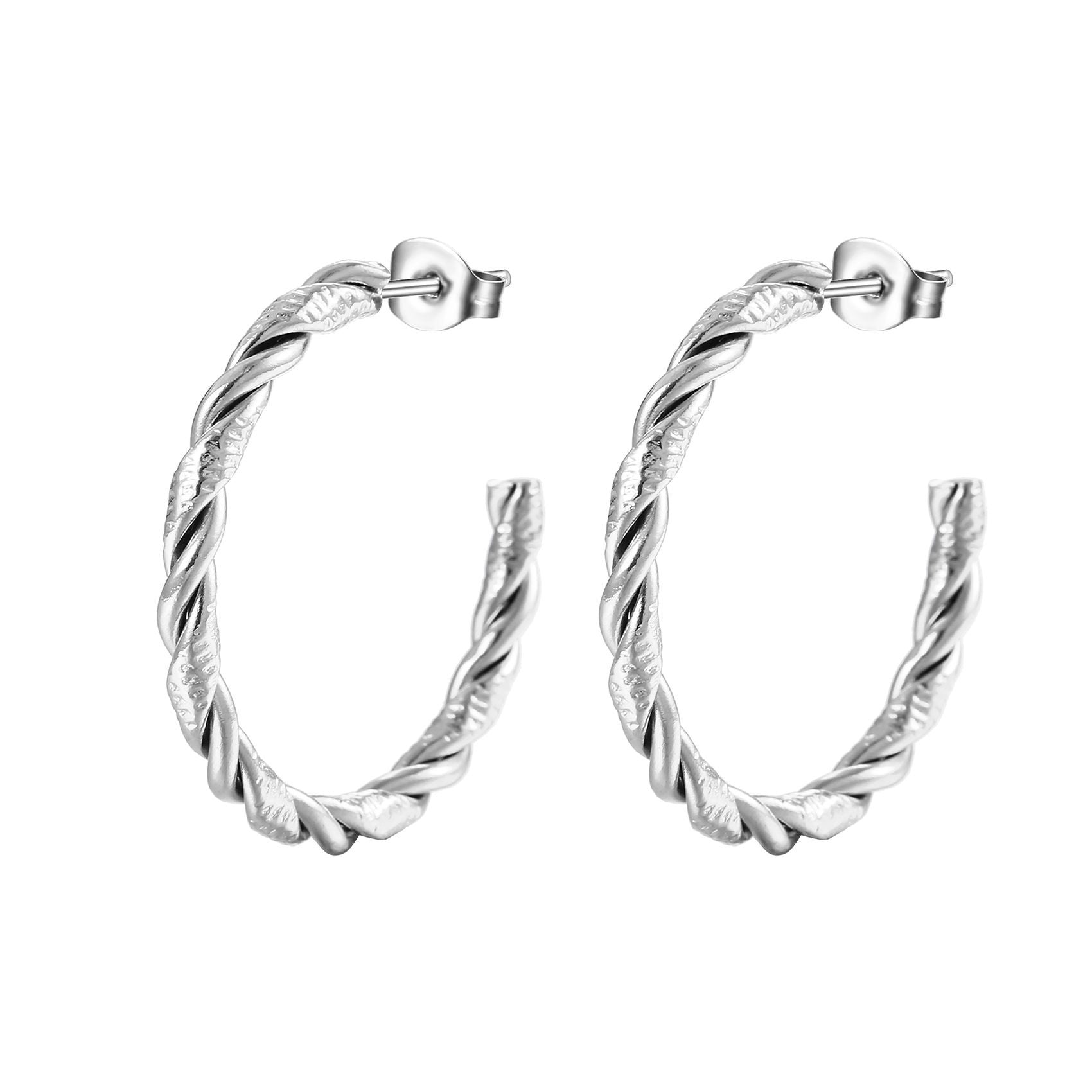 Pair of silver hoop earrings on a white background