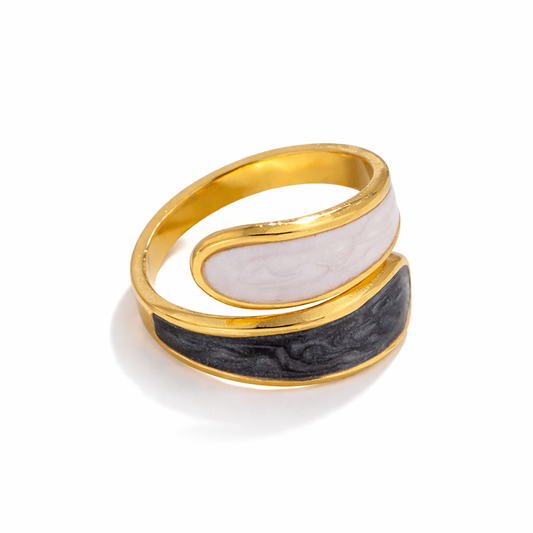 Gold and stone ring on a white background