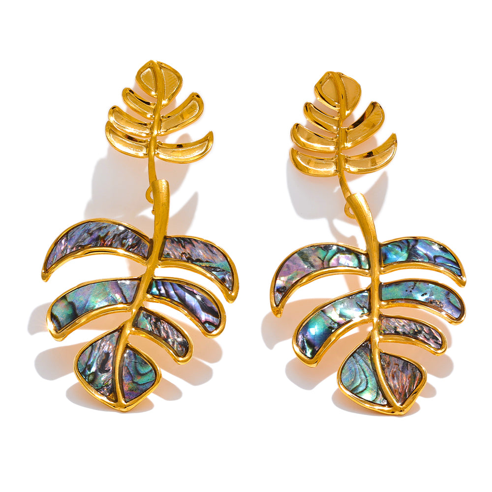Gold leaf statement earrings with abalone shell accents on a white background