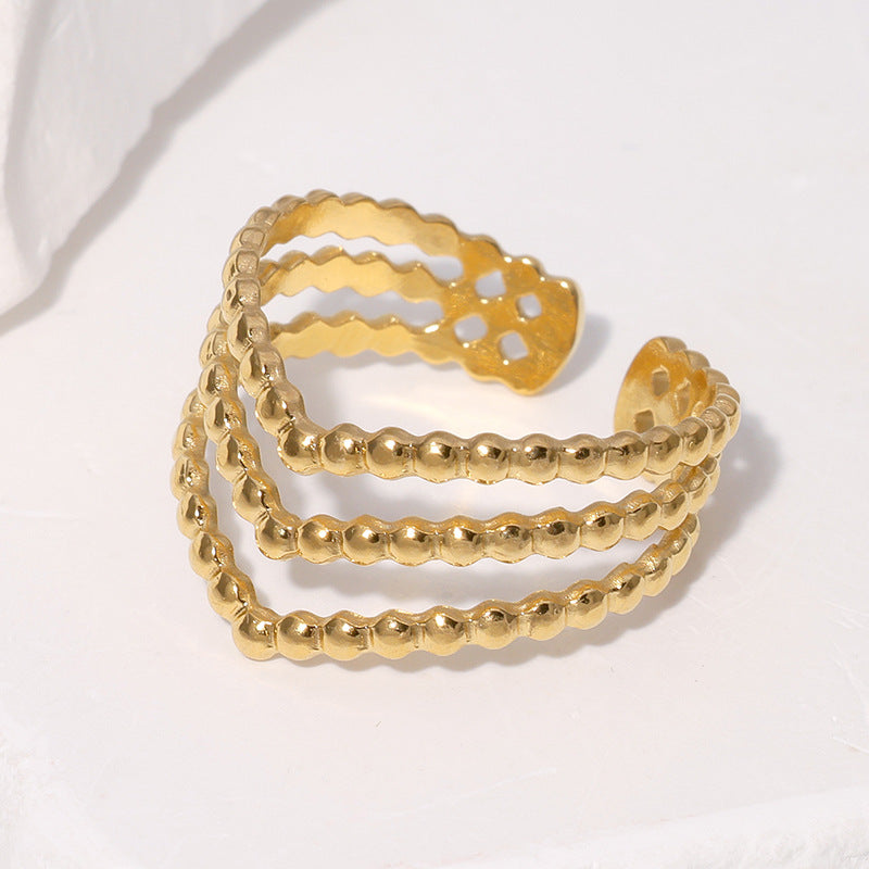 gold stainless steel ring with beaded design