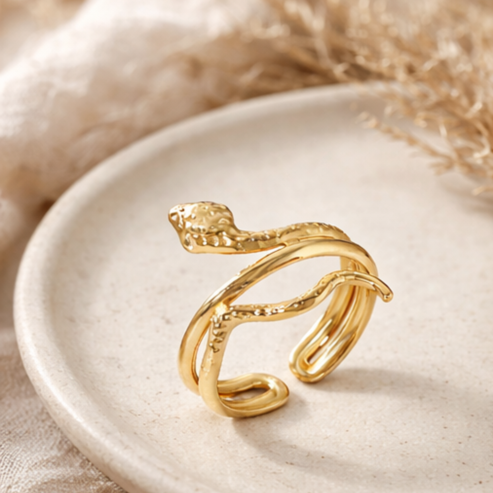 gold stainless steel ring with snake shape on lifestyle background
