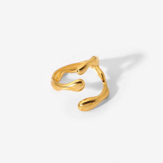 Gold open ring on a white background