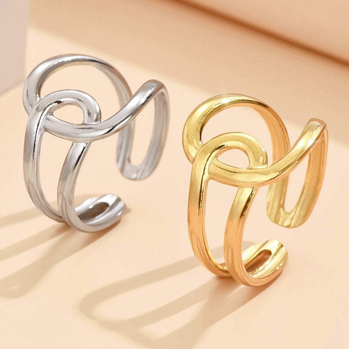 silver and gold stainless steel rings