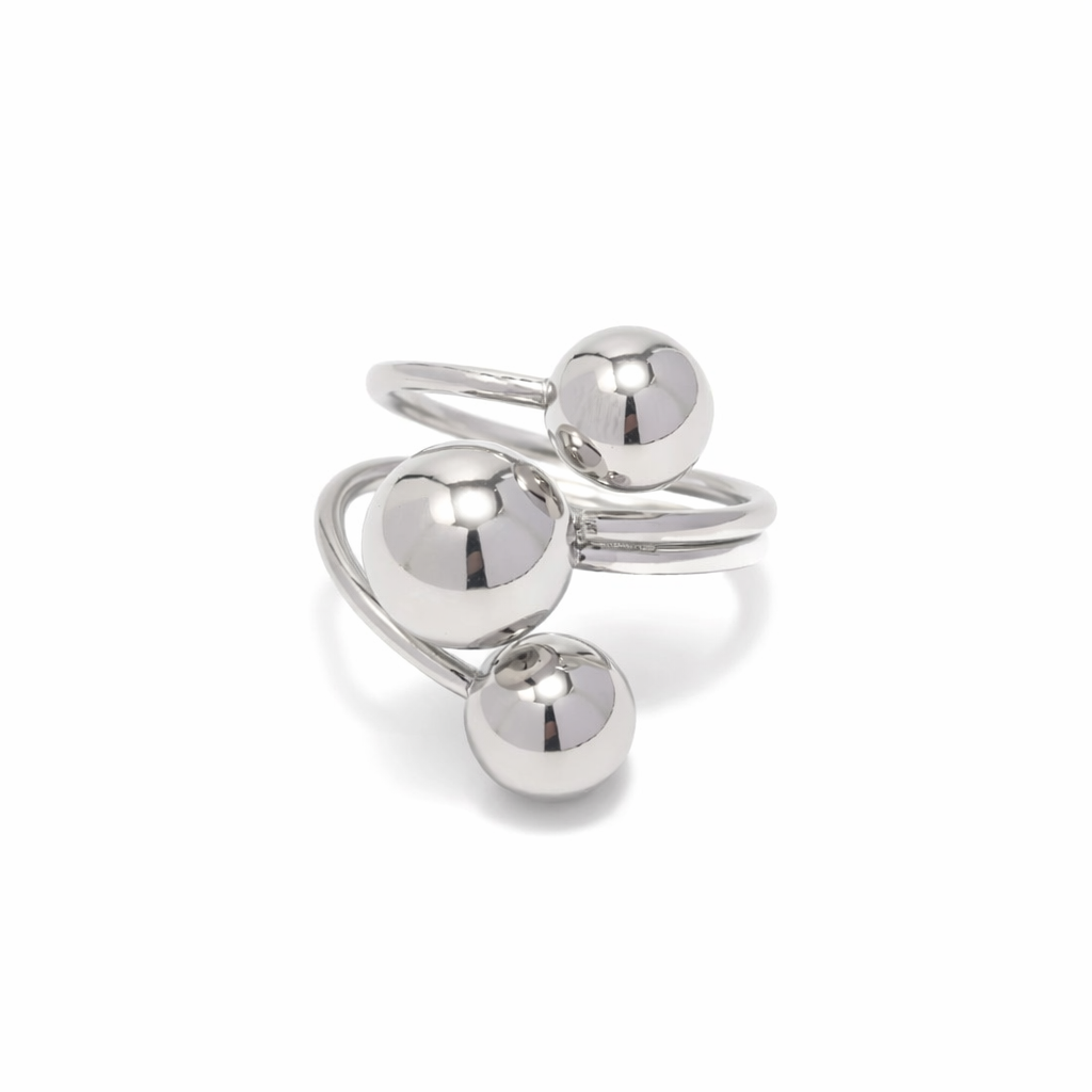 Silver chunky ring with three spherical components on a white background