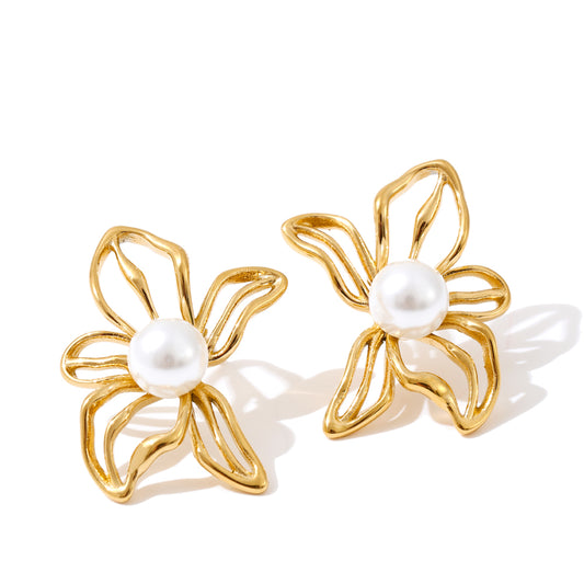 elegant gold studs in the shape of flower with pearl center
