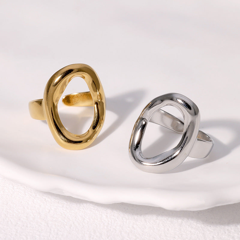 gold and silver chunky rings on white background