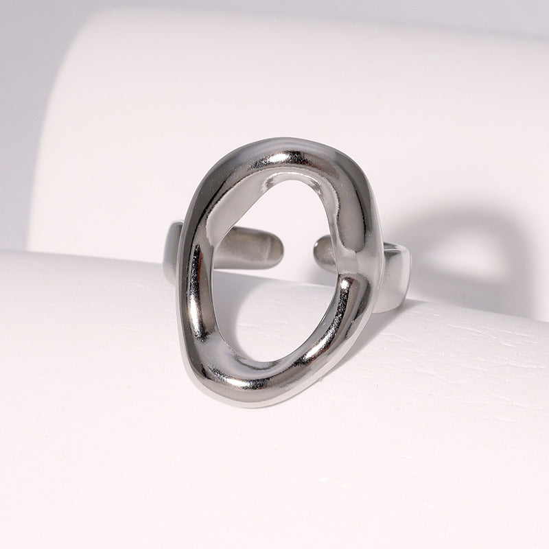 silver stainless steel ring on a white background