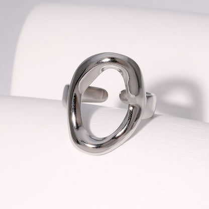silver stainless steel ring on a white background