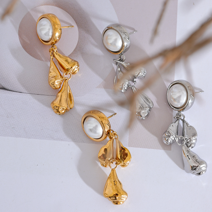 gold and silver long earrings with pearl