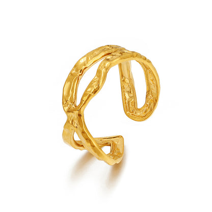 gold stainless steel ring on white background
