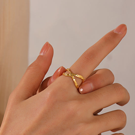 gold ring on person's hand