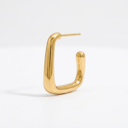 Gold rectangular hoop earrings made from waterproof stainless steel, featuring a polished finish and modern geometric design, Pola Grace.
