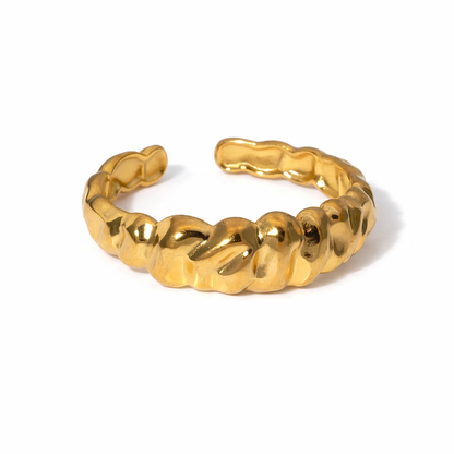 gold minimalist ring on white background