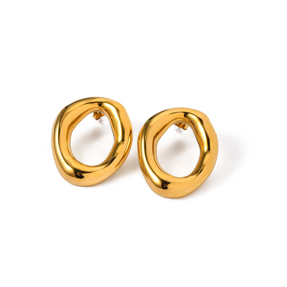 Pair of gold statement hoop earrings on a white background