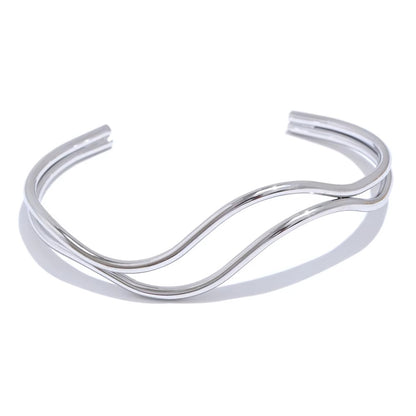 silver bangle on white background