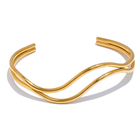 golden bangle on white background