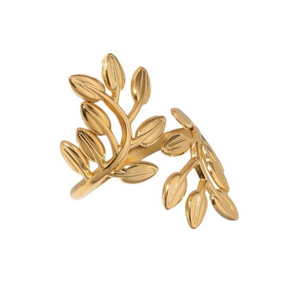 gold ring with leaf design on white background