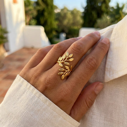 waterproof gold ring on female's hand