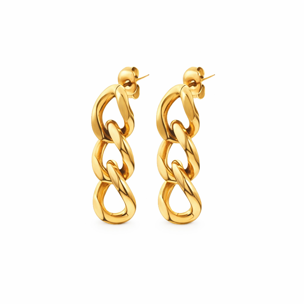 gold chain earrings on white background